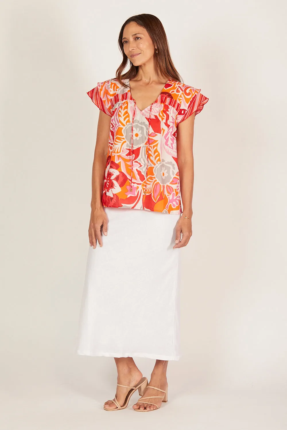 Goldie Flutter Sleeve Top in Coralene