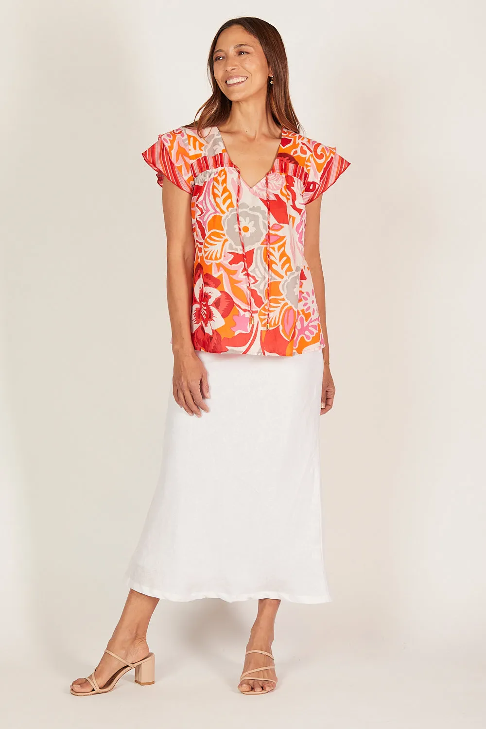 Goldie Flutter Sleeve Top in Coralene