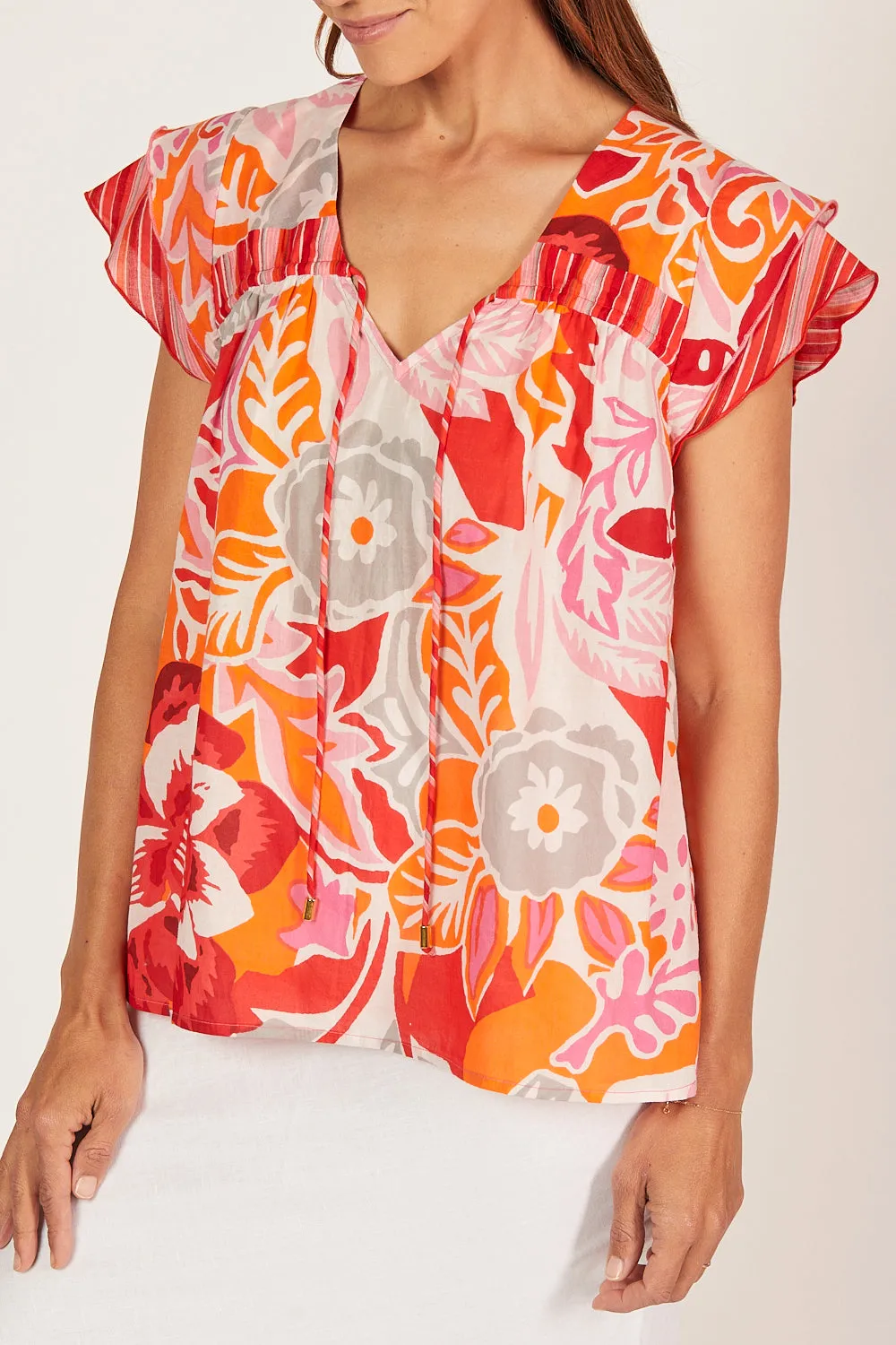 Goldie Flutter Sleeve Top in Coralene