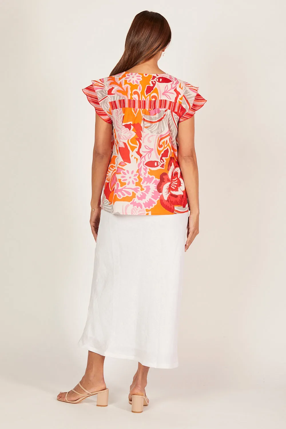 Goldie Flutter Sleeve Top in Coralene