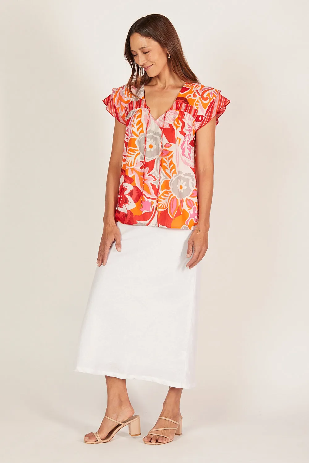 Goldie Flutter Sleeve Top in Coralene