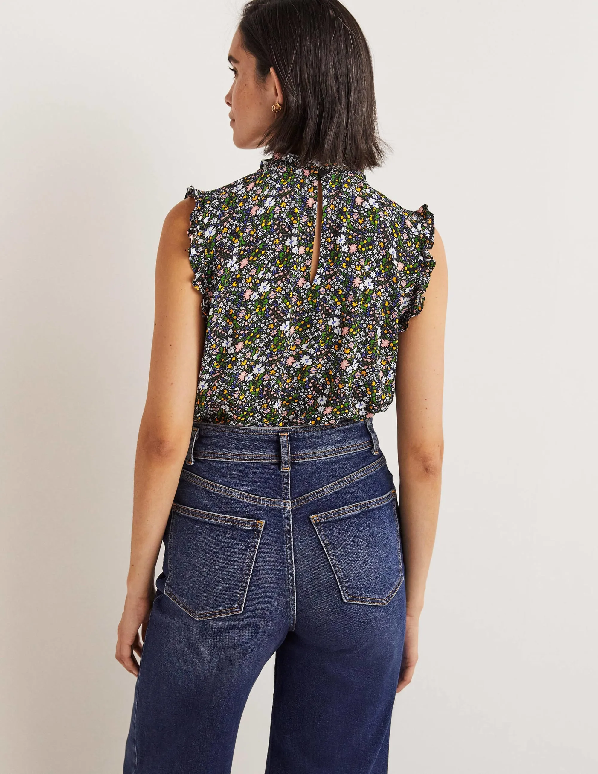 Sleeveless Smocked Top-Black. Abstract Ditsy