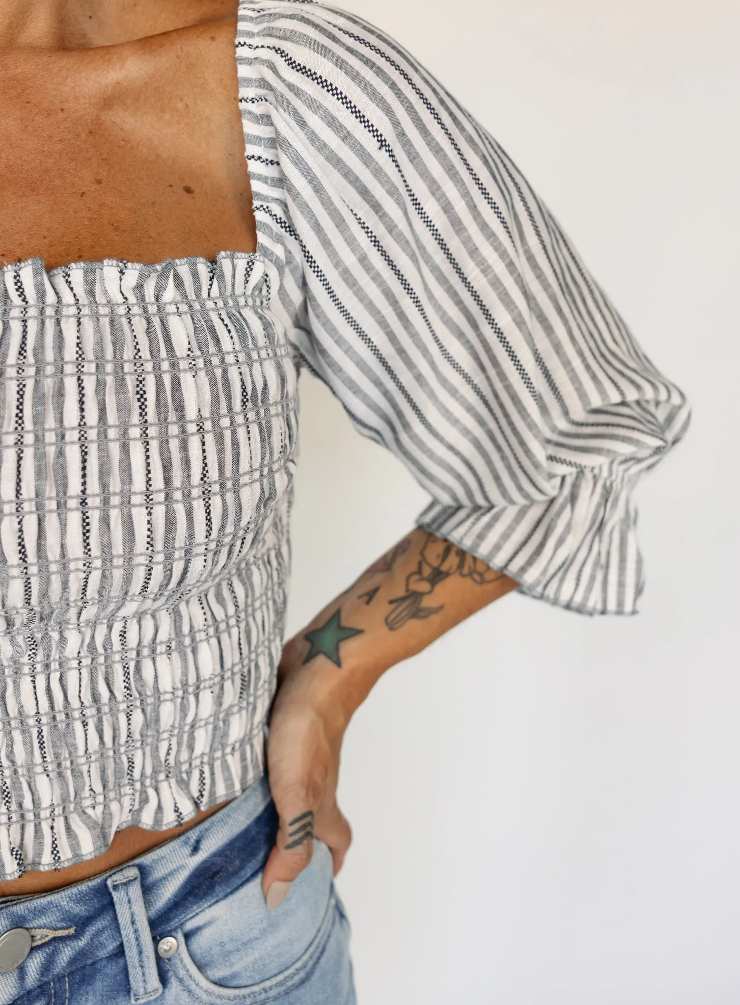 Van Striped Smocked Top